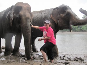 Crystal giving Somboon a nice mud bath, with Malee in the mix also a while volunteering at Elephants World