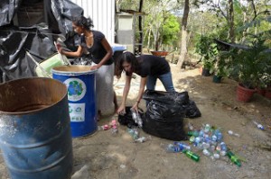 Recycling plastic bottles for a sustainable resource volunteer project.